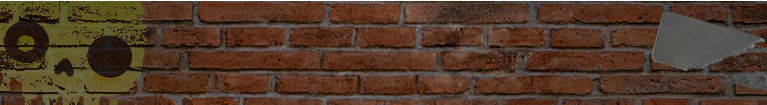 brick wall with skull grafitti