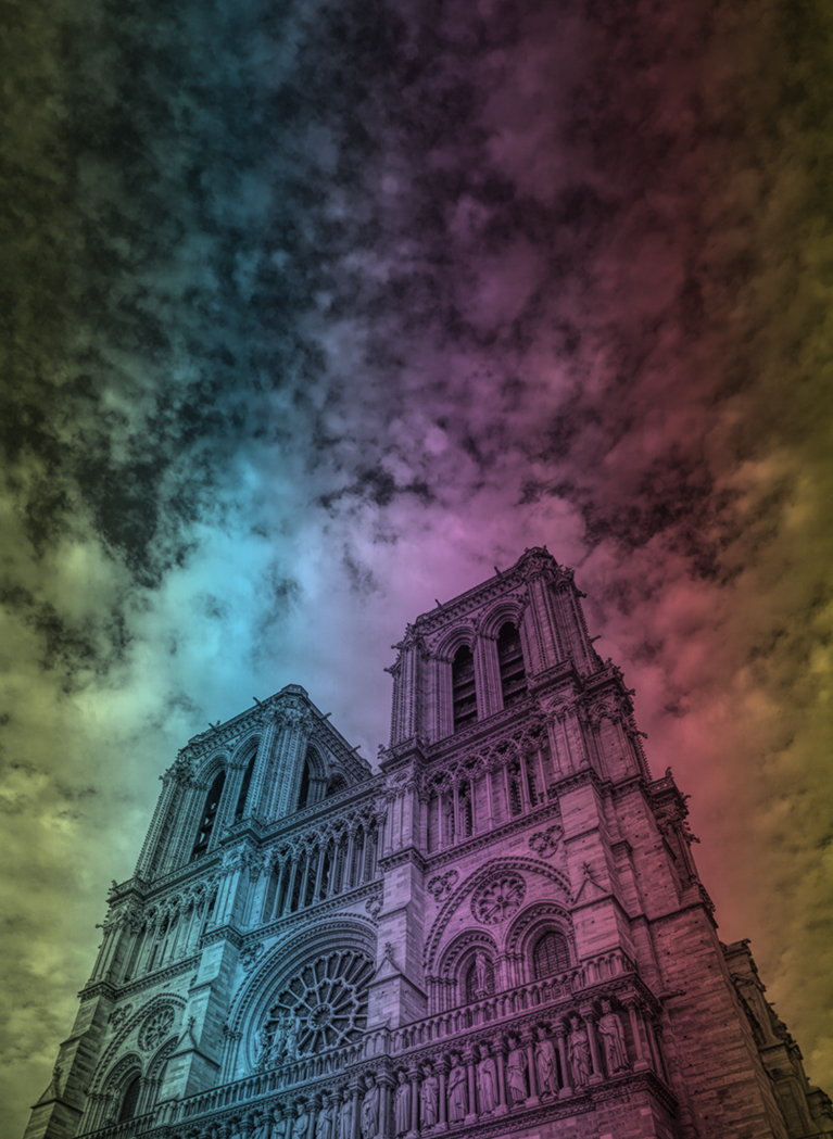 Rainbow tone clouds with a cut off image of Notre Dame Cathedral on the right