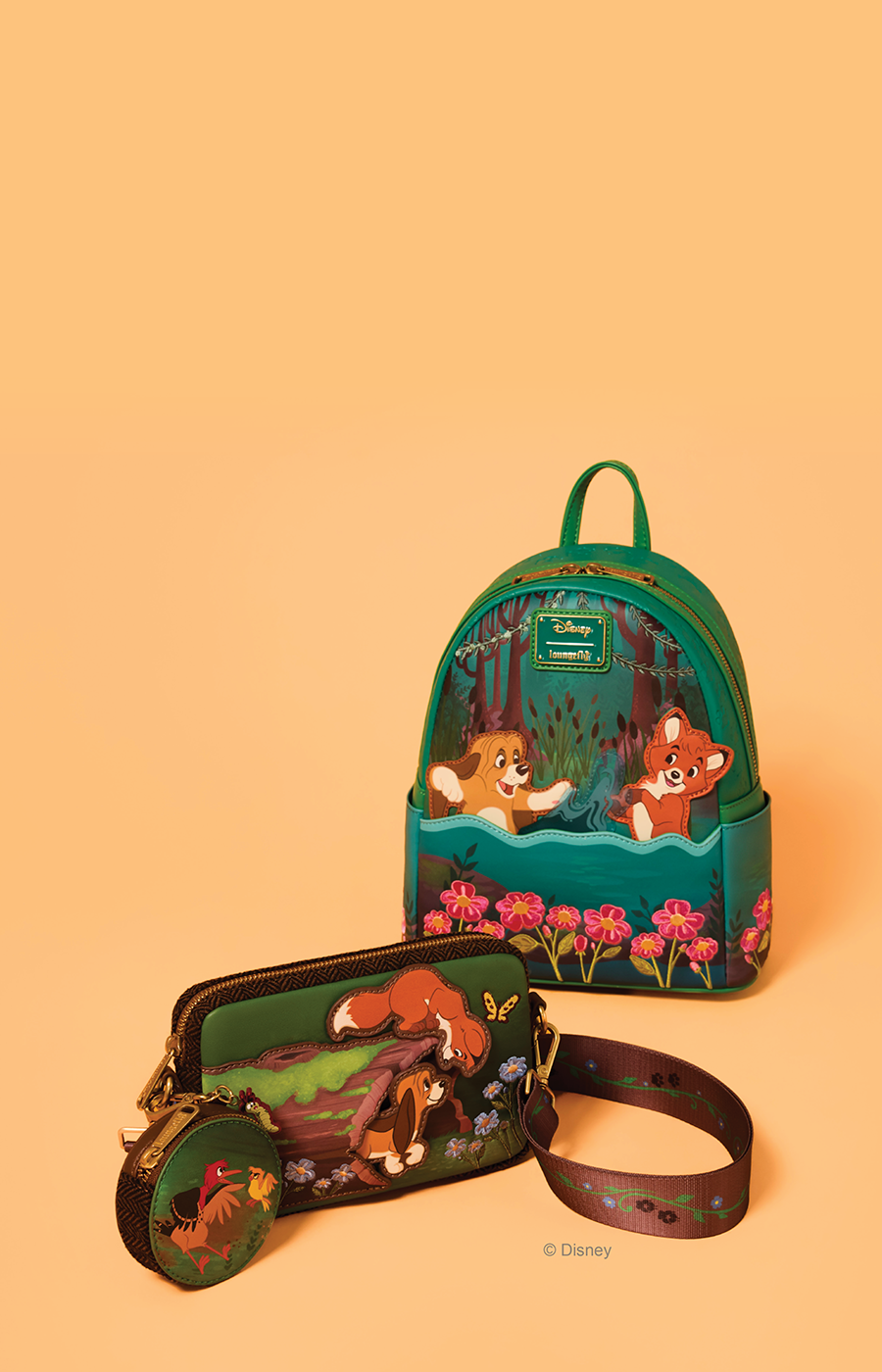 Orange background with Disney Fox and the Hound backpack and crossbody displayed