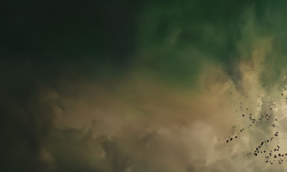 Abstract green and beige smoky background with textured clouds and scattered dark speckles, creating a moody, atmospheric backdrop.