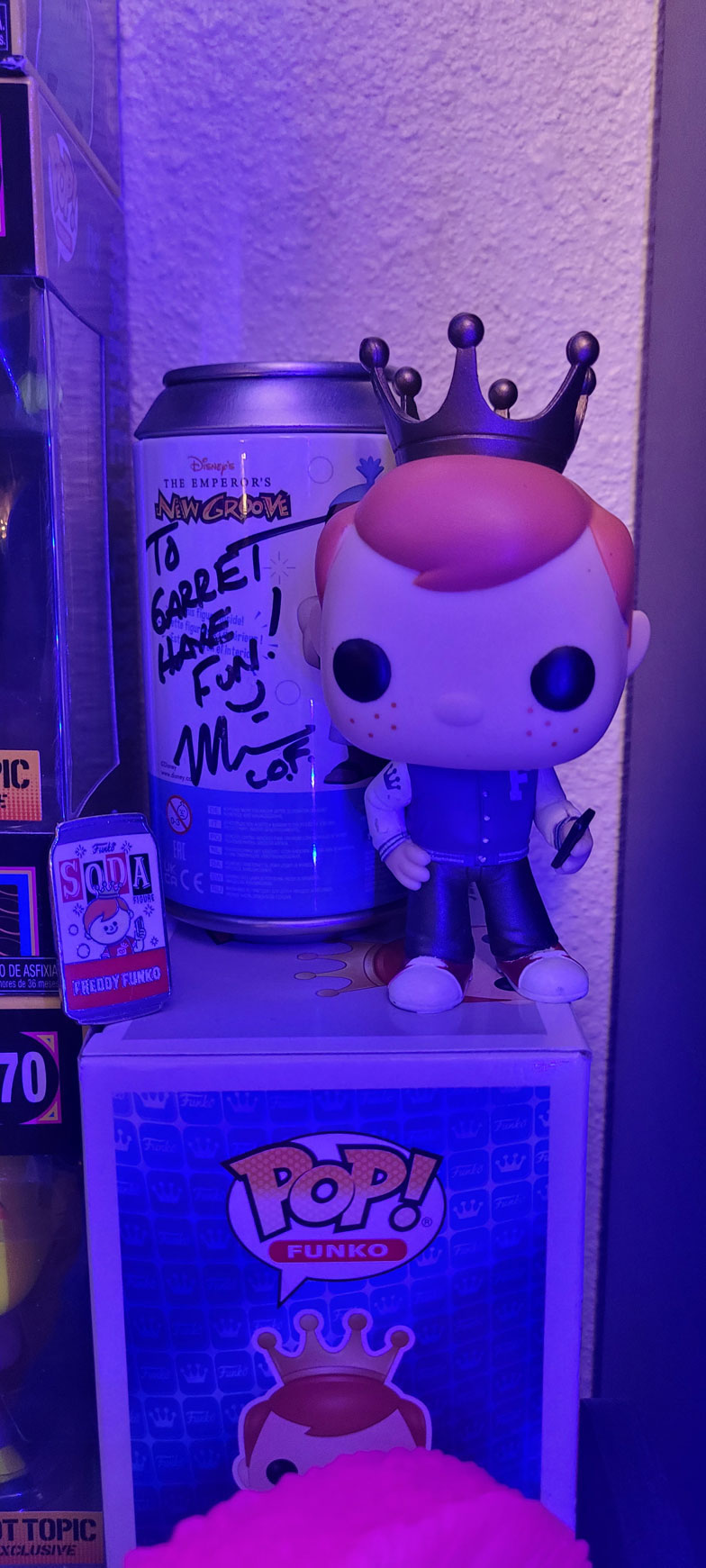 Garret's Social Media Freddy in front of a Funko Soda signed by Mike Becker