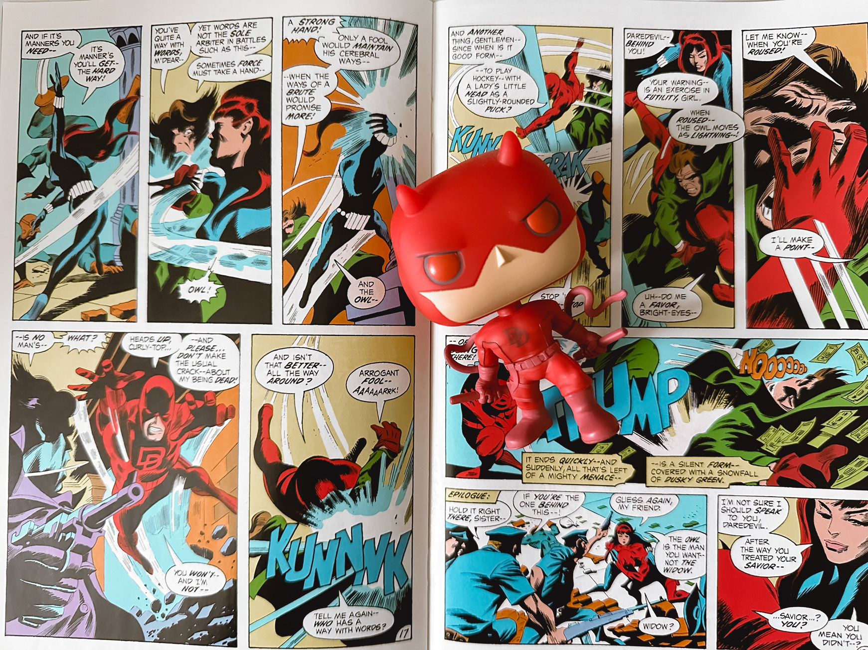 Daredevil Pop! in front of Daredevil comic pages