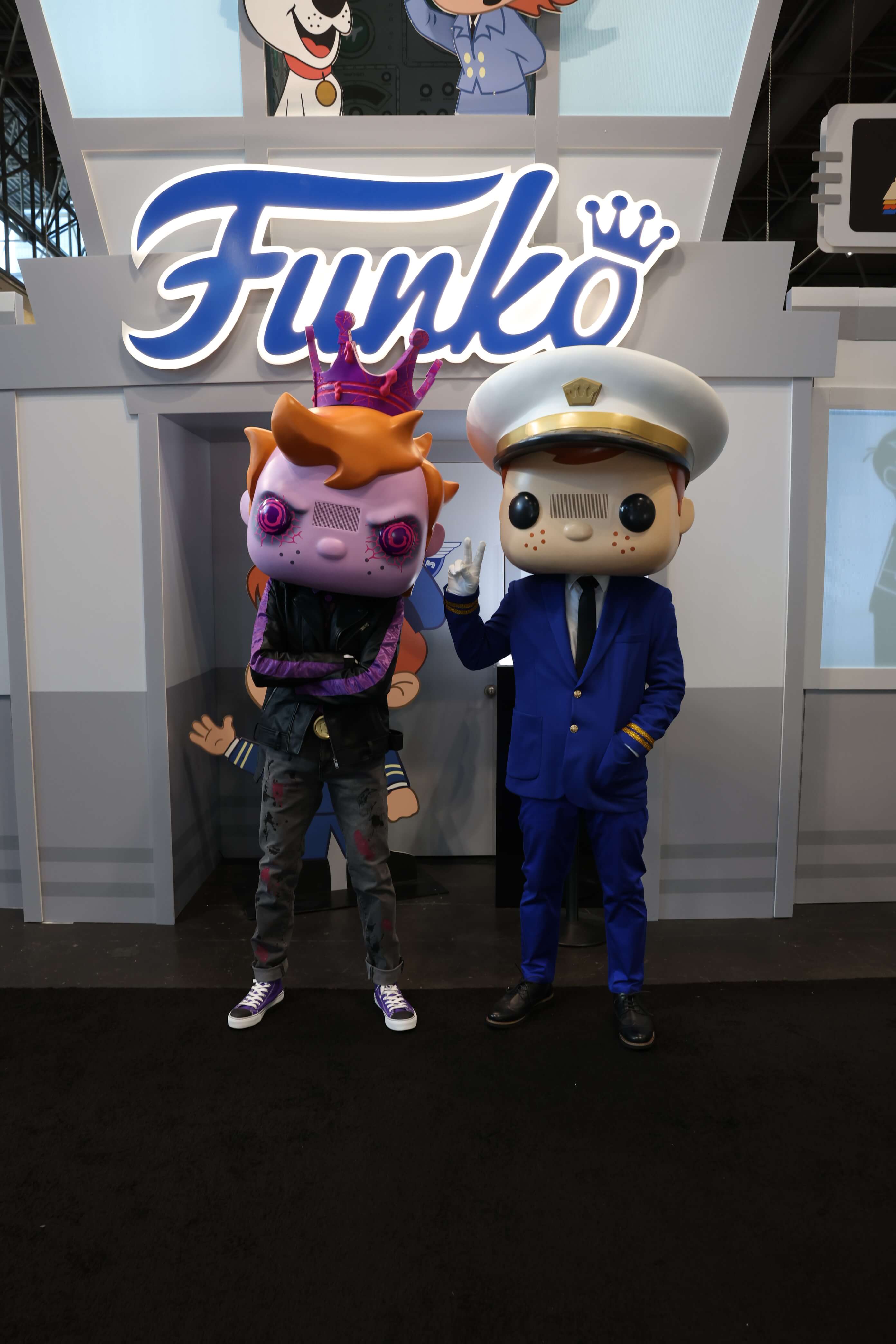 Freddy and Eddy mascots standing side by side.