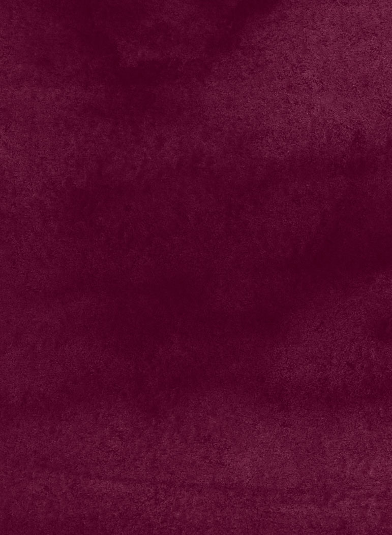 Maroon background with grainy, velvet texture