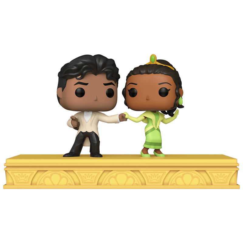 Pop! Tiana and Naveen hold hands while dancing on a stage. Naveen wears a white suit jacket while holding a ukulele in his right hand. Tiana wears a green dress and evening gloves while a tiara sits on her head.