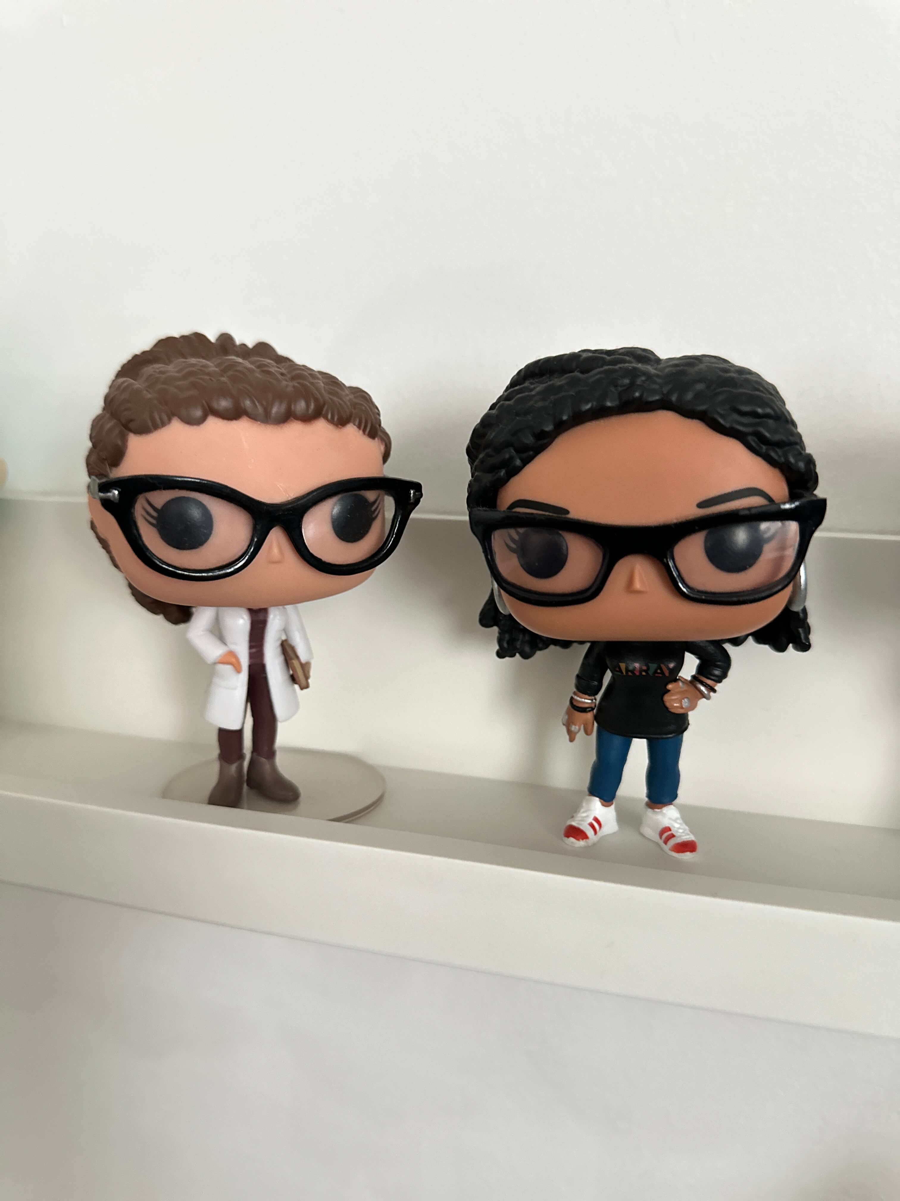 POP! Cosima Niehaus and POP! Ava DuVernay on a white shelf against a white background
