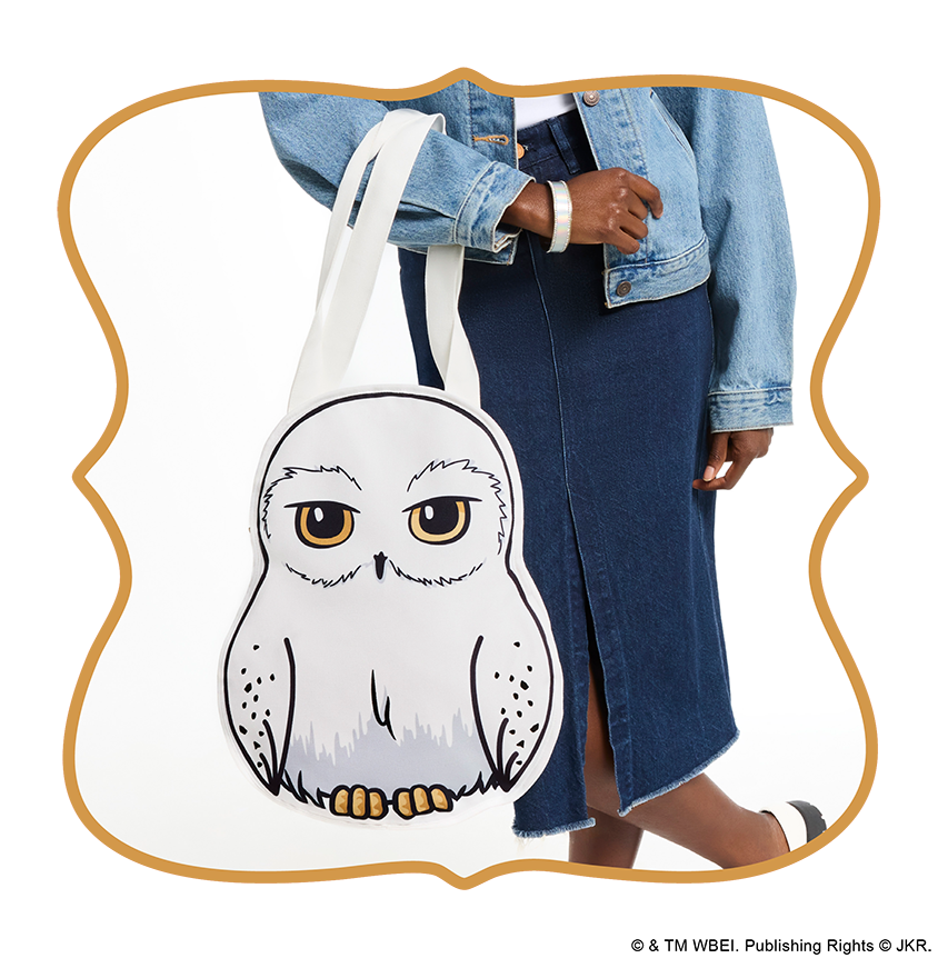 Green background with model showcasing Loungefly Wicked: For Good I Feel Wicked Crossbody Bag