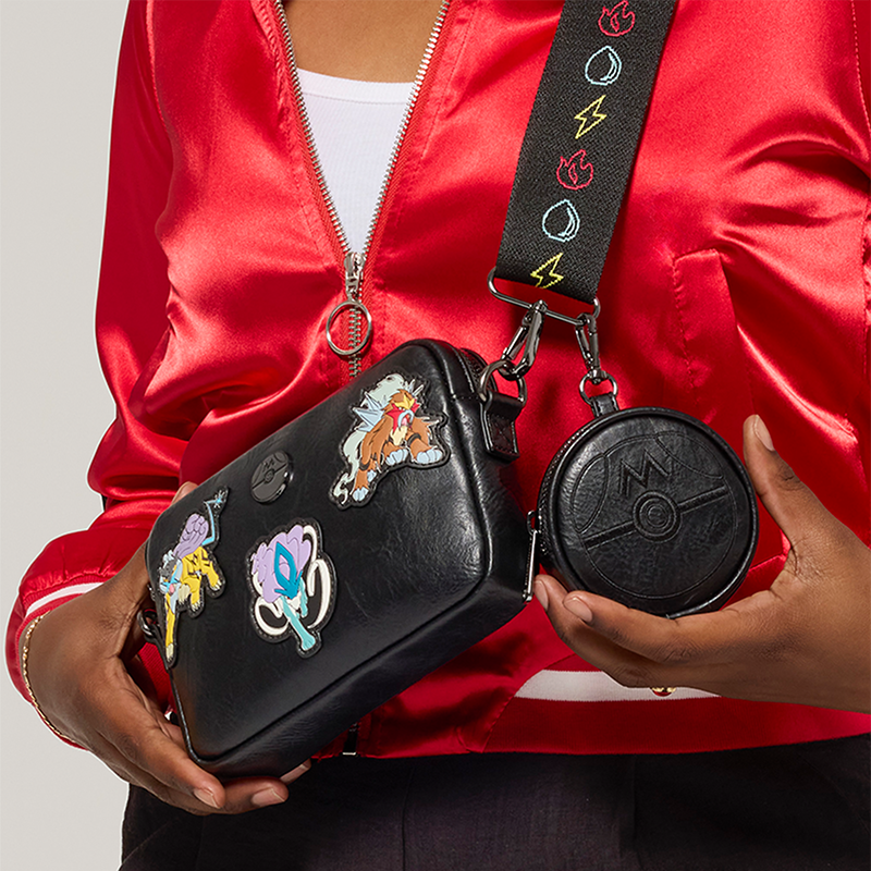 Gray background with model showcasing Loungefly Pokemon sling bag