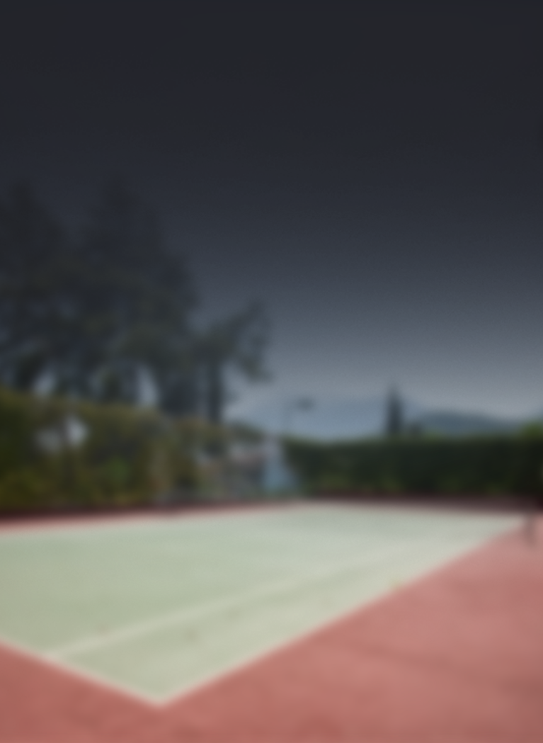 Sunny tennis court background with Green trees and shrubs and a Black gradient overlay