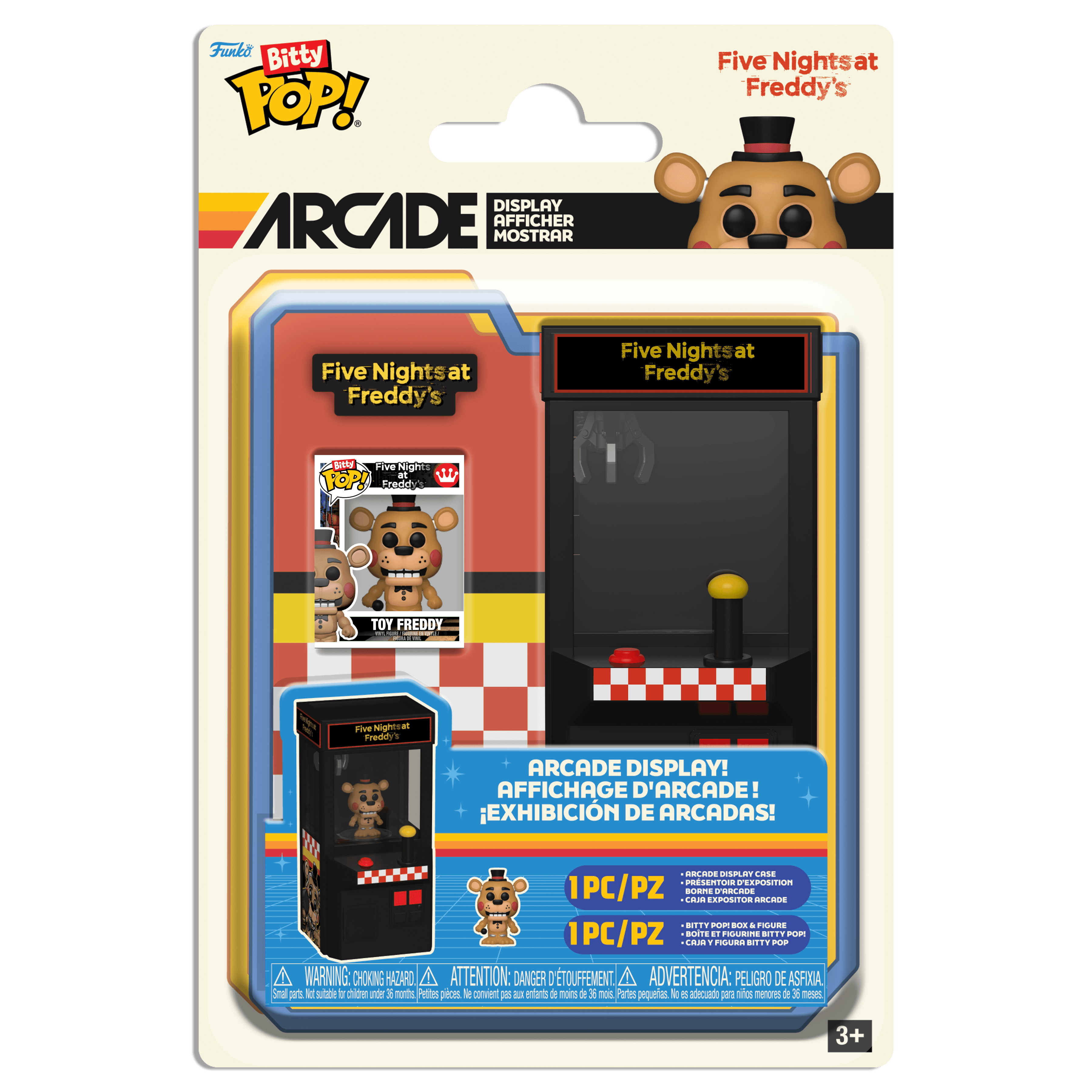 This image displays a photo of Bitty POP! Arcade Five Nights at Freddy's. The claw-machine shaped collectible is visible, along with at Bitty POP! of Toy Freddy.