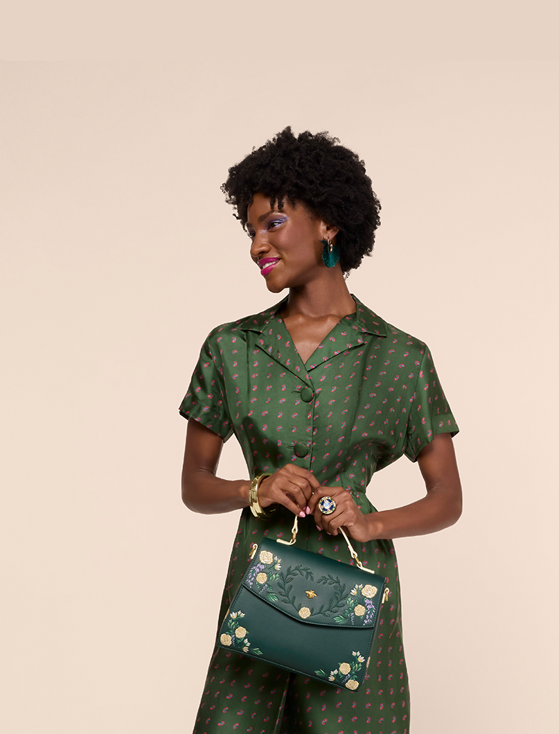 Tan background with model featuring Loungefly Bridgerton collection