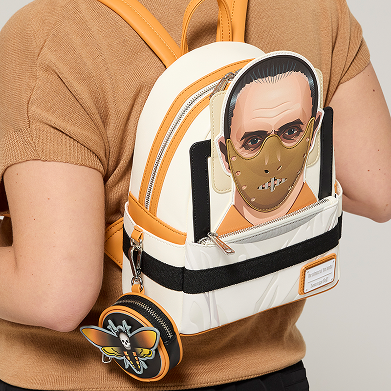 Tan background with model wearing Loungefly Silence of the Lambs Exclusive mini backpack