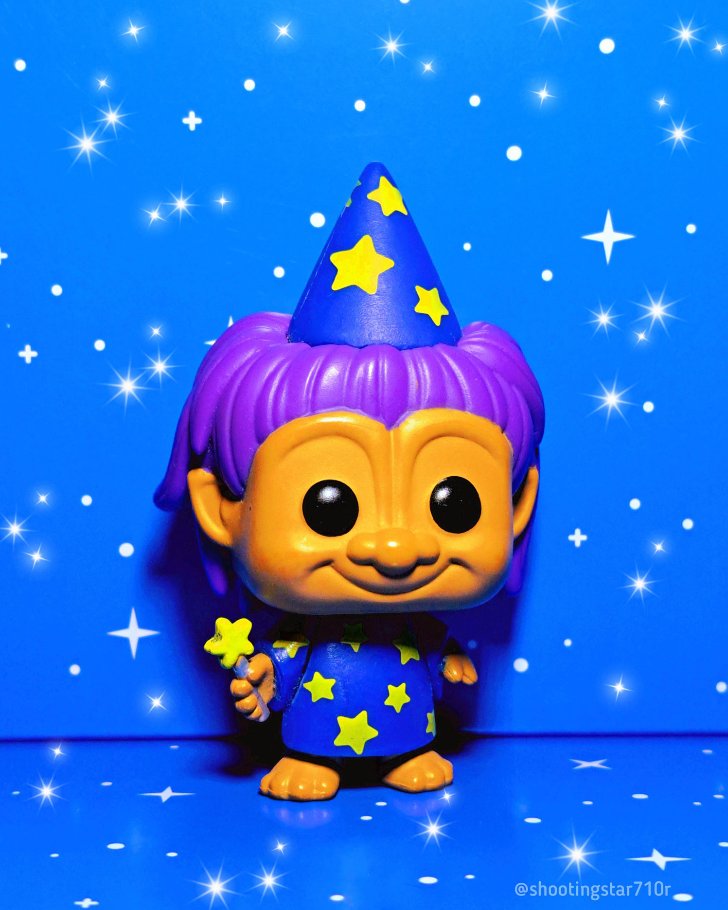 Troll in Pajamas Funko Pop! Figure on a starry background