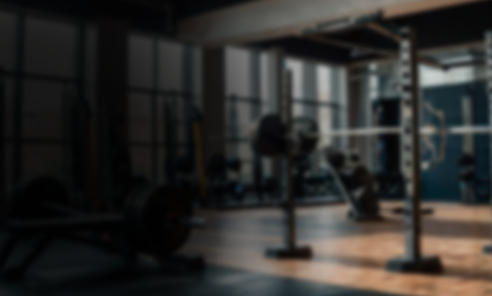 Gym background with squat rack and Black fade